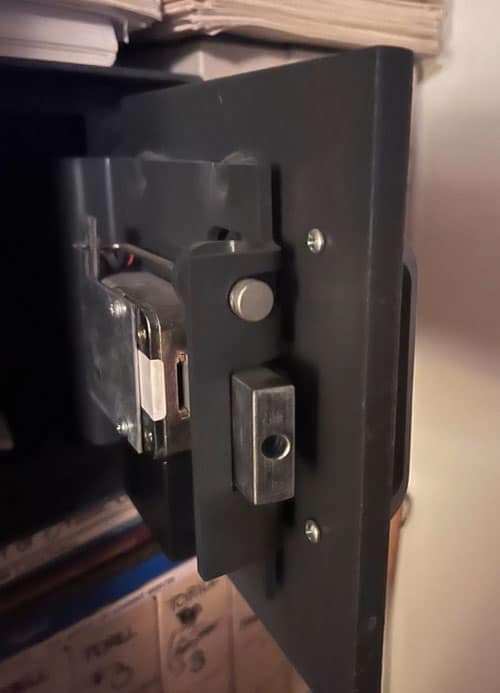 image of the inside of a small safe door
