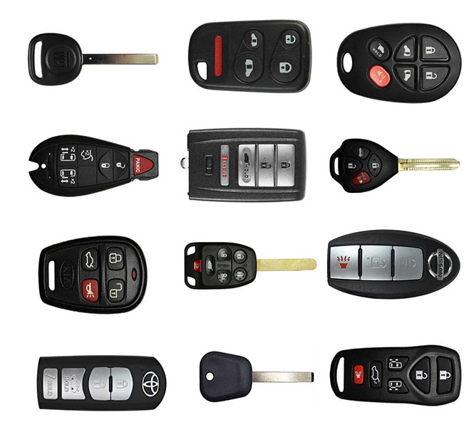 assorted automotive keys, fobs, and remotes